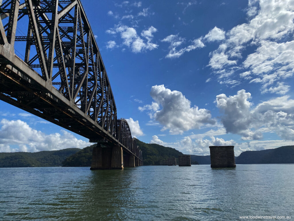 The heritage-listed Hawkesbury River railway bridge and next to it the remains of an 1889 railway bridge.